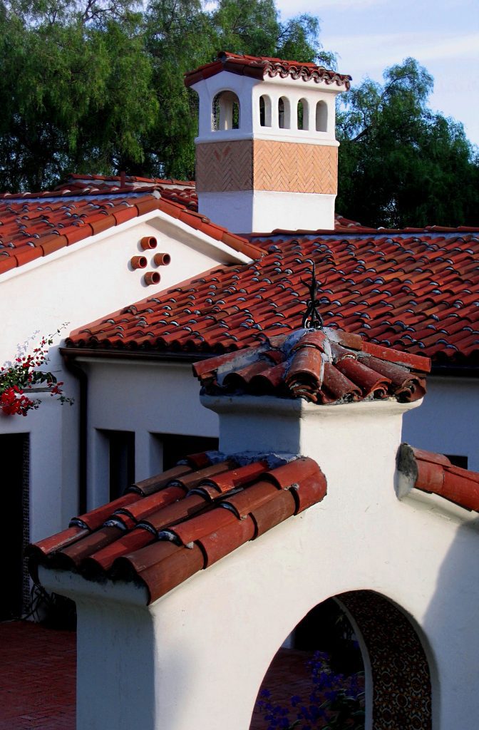 a Spanish Chimney and Patio Garden Archway Designed by Jeff Doubet, a Santa Barbara Home Designer