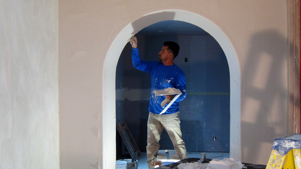 Drywall Mud Specialist Working on Spanish Arch in Montecito California Creating Spanish Style Homes®