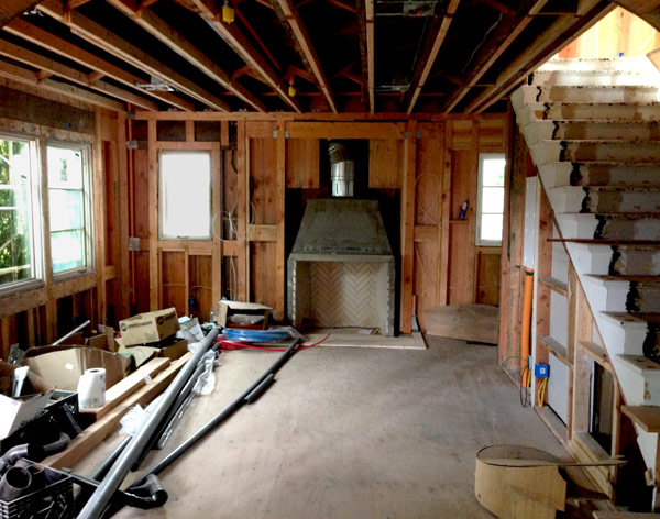 a High Quality Fireplace Insert Being Installed in a Spanish Style Home Renovation in Santa Barbara, California