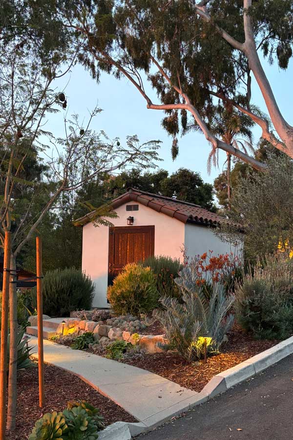 Santa barbara spanish shed with red tile roof and smooth stucco siding