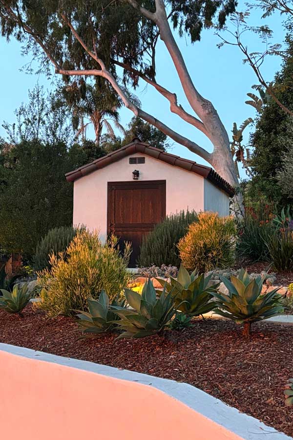 A spanish garden shed, site wall and succulent landscape in beautiful santa barbara, ca