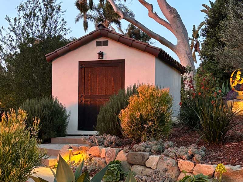 High quality spanish shed with santa barbara sandstone garden walls